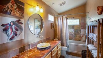 Combined shower/tub, jetted tub, hair dryer, towels