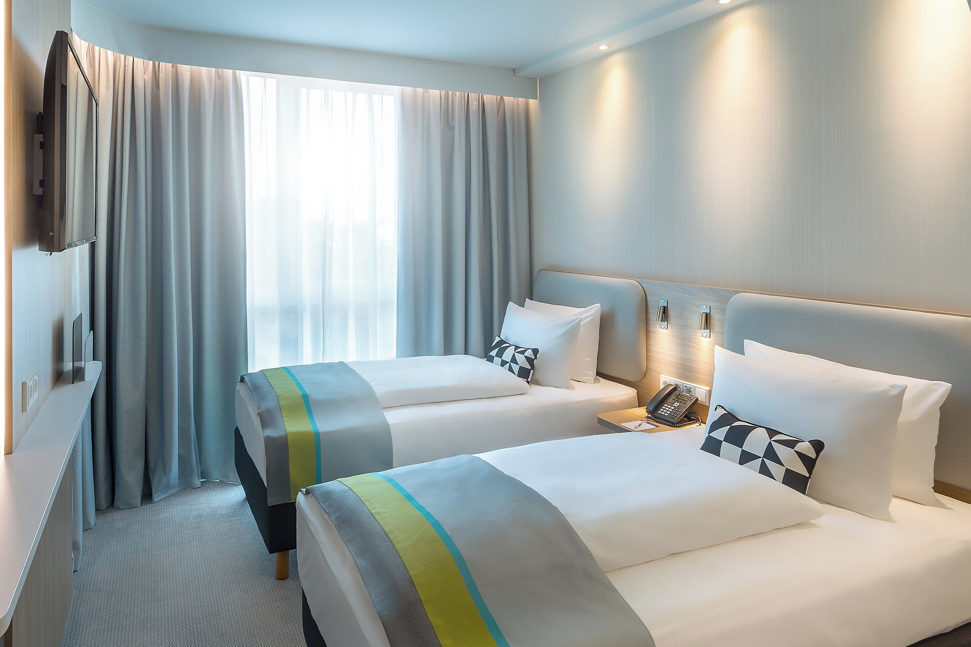 Hypo-allergenic bedding available, in-room safe, desk, laptop workspace