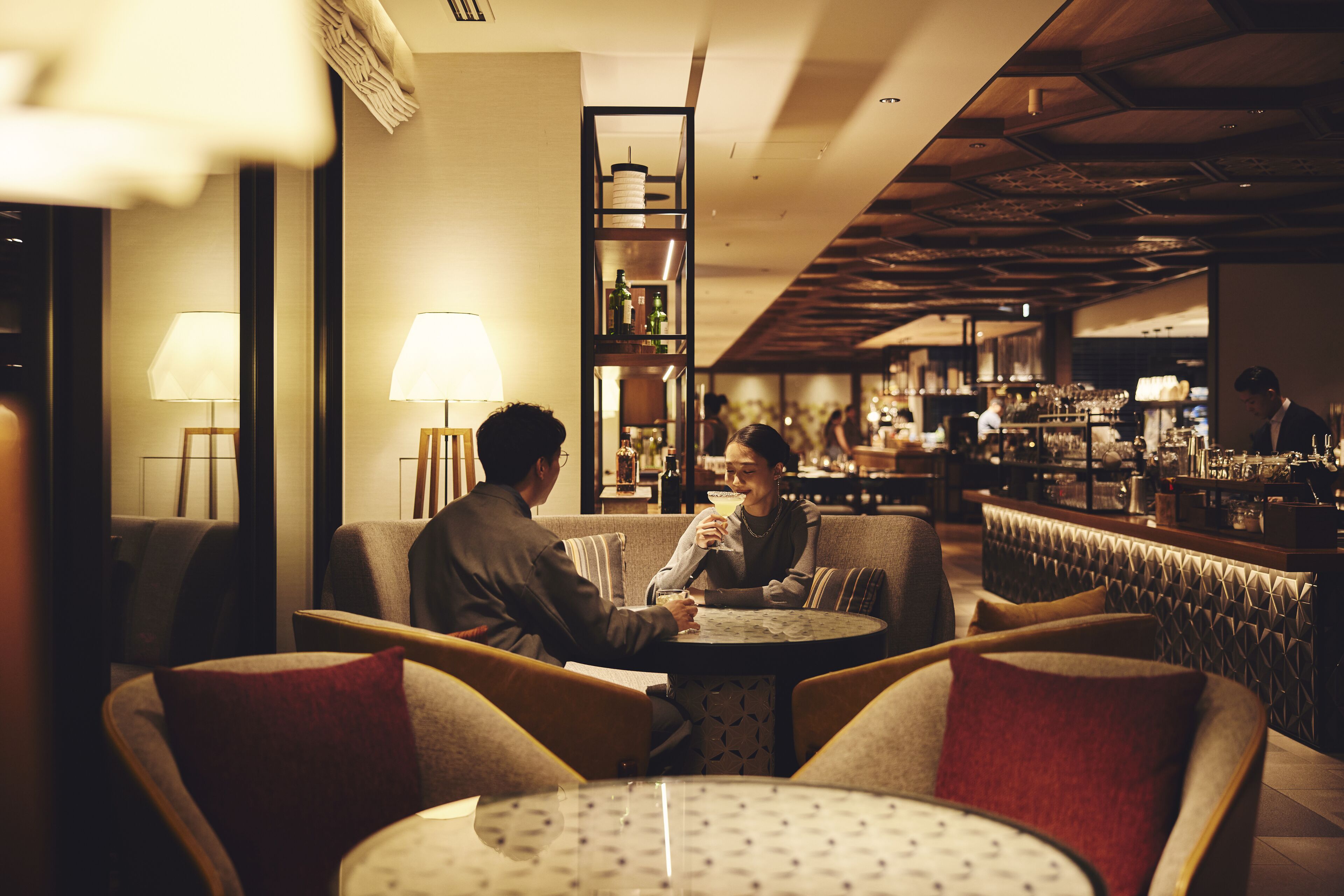 A bar area with seating and a bar counter.
