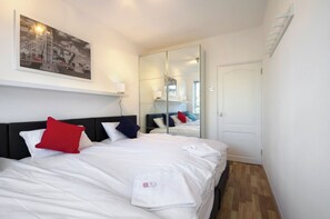 2 habitaciones, tabla de planchar con plancha, wifi y ropa de cama