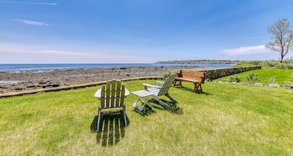 Inviting oceanfront home with fireplace, firepit, & views from every room