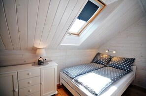 2 habitaciones, tabla de planchar con plancha y cuna de viaje 