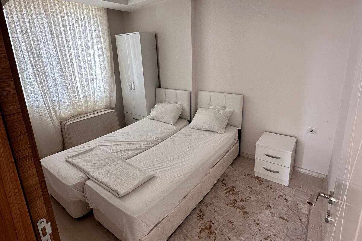 Apartment, 1 Bedroom | Desk, laptop workspace, iron/ironing board, rollaway beds