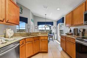 Fridge, microwave, oven, stovetop - Wheelchair accessible Lakeview 4BR house with pool, spa, themed rooms, game room (Kissimmee)