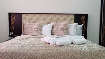 Seprai premium, selimut bulu angsa, dan tempat tidur Select Comfort