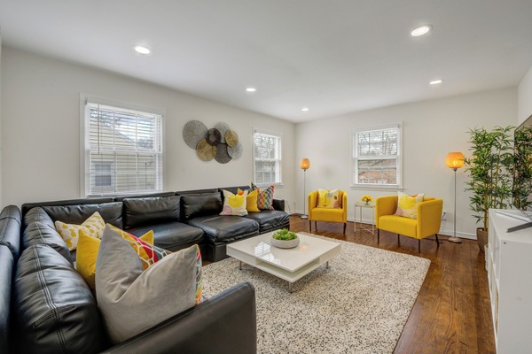 Living Room w/Two Single Size Sofa Beds and 55 Inch Samsung TV