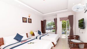 Deluxe Quadruple Room | Minibar, desk, laptop workspace, soundproofing - Kyo Hotel (Ho Chi Minh City)