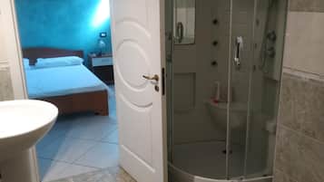 Regadera, amenidades de baño gratuitas, secadora de cabello, bidet
