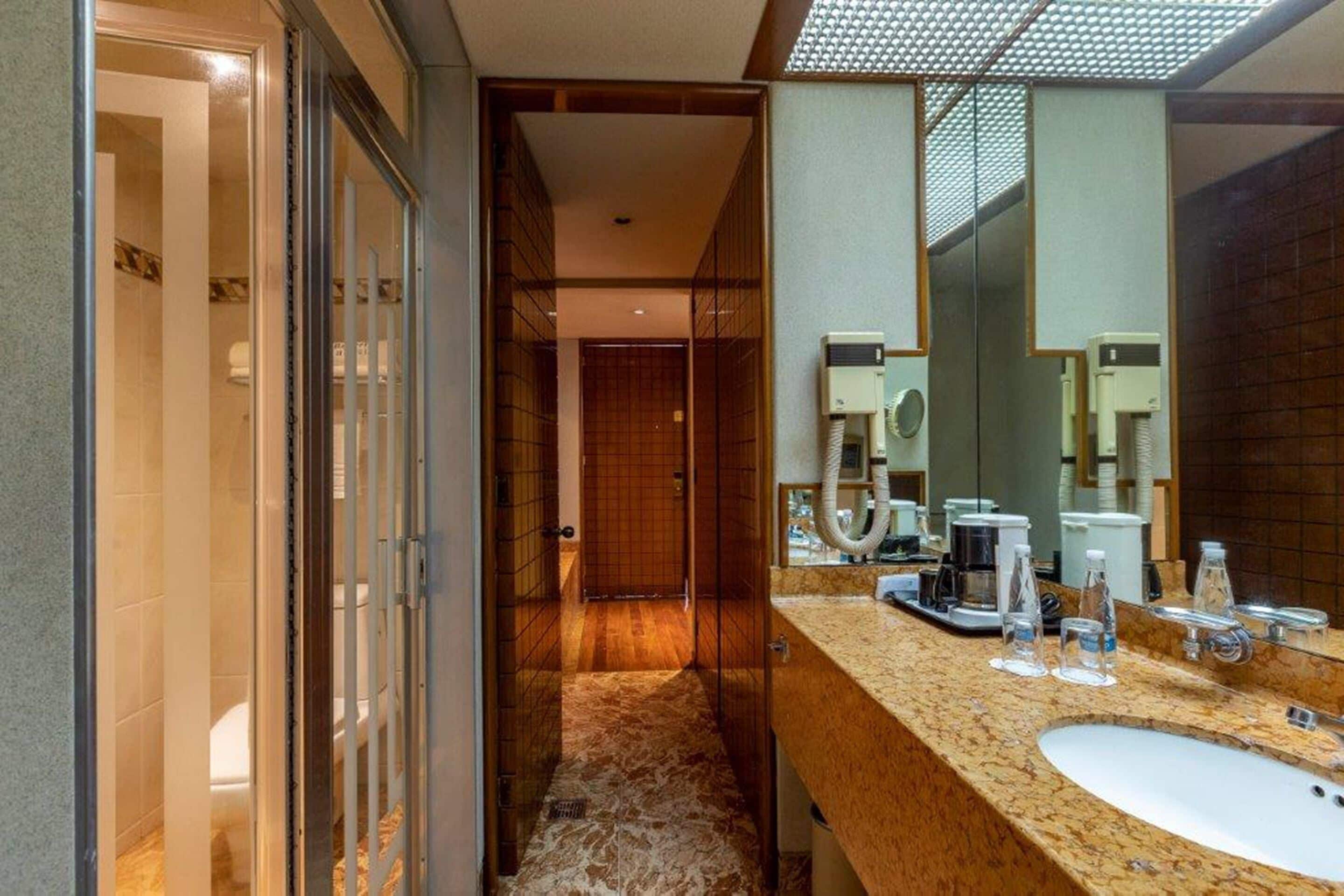 premium suite | bathroom | free toiletries, hair dryer, towels, soap
