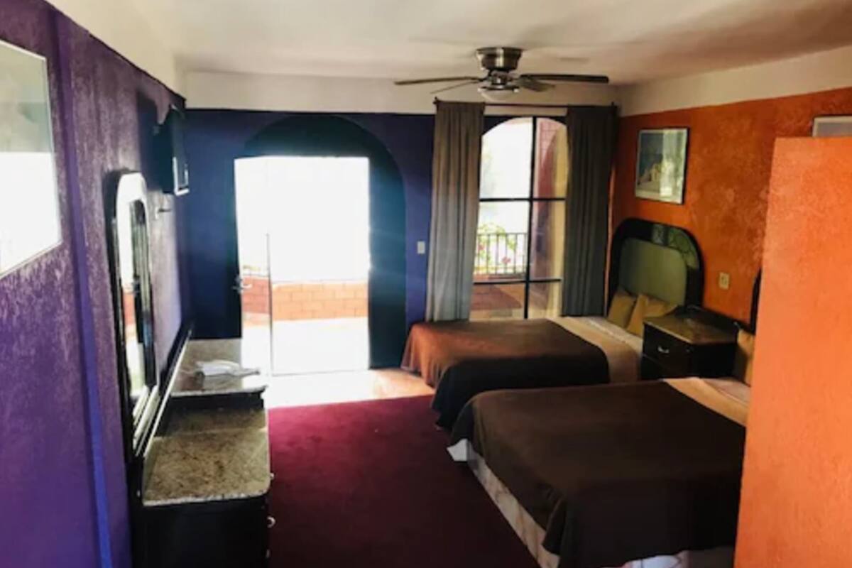 Basic Double Room, 2 Queen Beds, City View | Blackout drapes