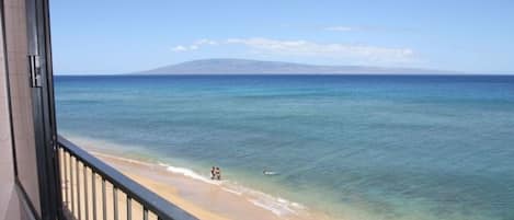 On the beach, sun loungers, beach towels