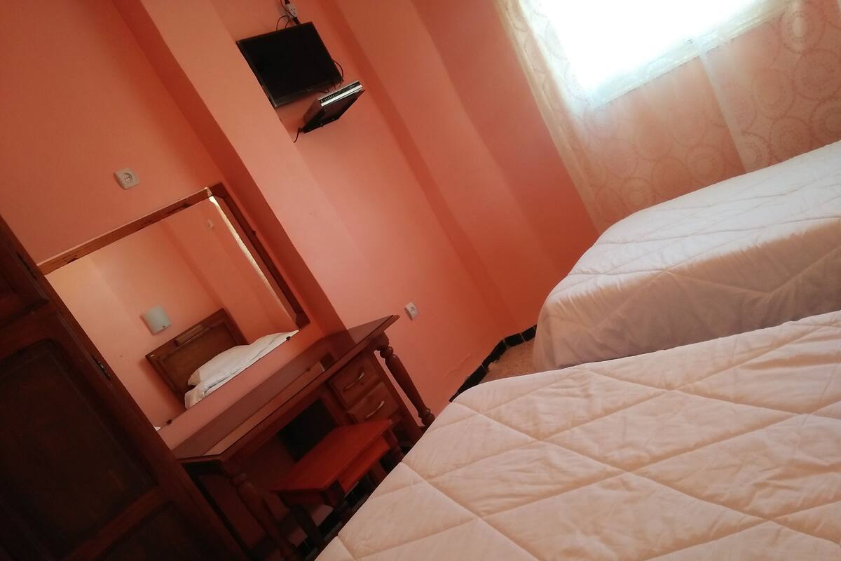 Desk, laptop workspace, blackout drapes, cribs (free)