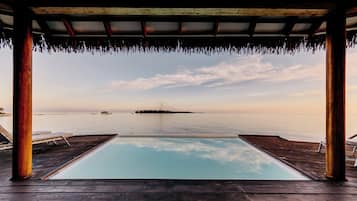 Outdoor pool, pool umbrellas, pool loungers