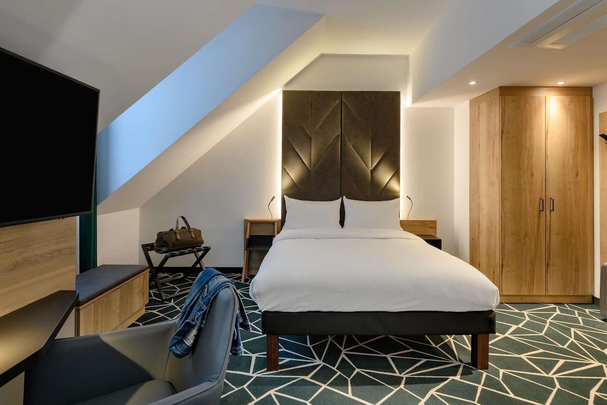 Family Room, Multiple Beds (Modern with Double bed and Sofa Bed) | In-room safe, desk, blackout drapes, soundproofing