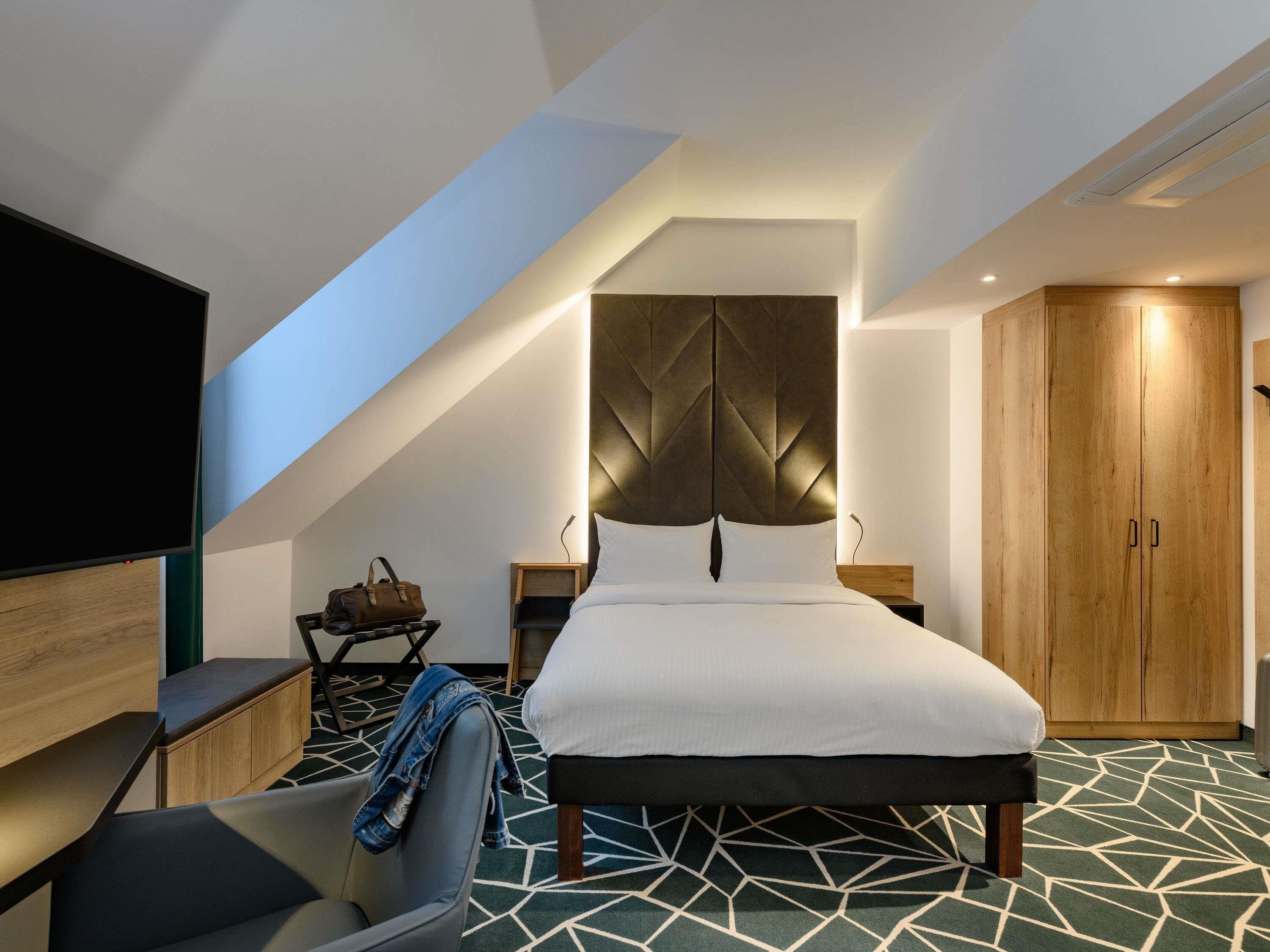 Family Room, Multiple Beds (Modern with Double bed and Sofa Bed) | In-room safe, desk, blackout drapes, soundproofing