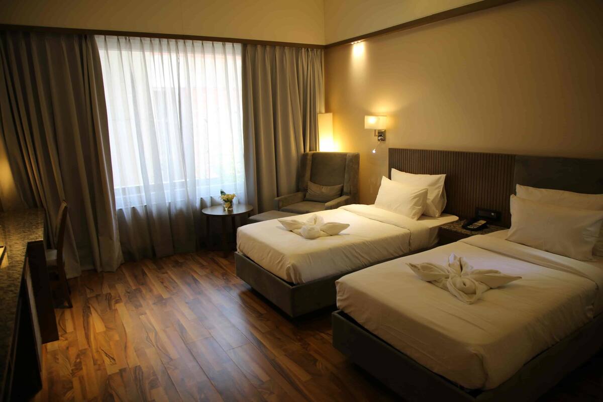 Chambre Deluxe avec lits jumeaux, vue cour intérieure
