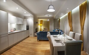 Premium Apartment | Living area | 42-inch Smart TV with cable channels, TV