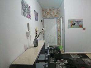 Apartment | Living area | 65-inch flat-screen TV with satellite channels, TV - Sheraton Area Cozy 2 BDR (Hurghada)