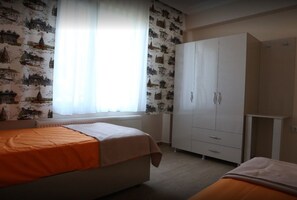 Departamento estándar | Escritorio, wifi gratis y ropa de cama