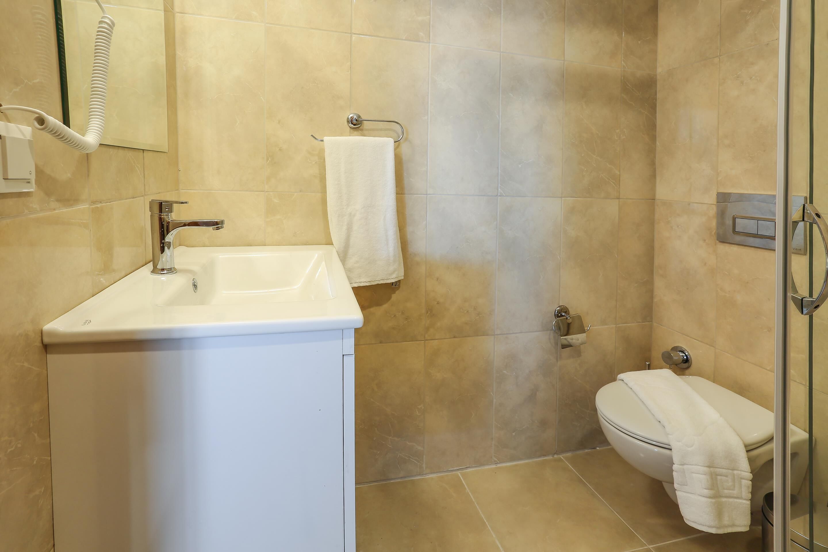 standard suite, 1 queen bed with sofa bed, sea view | bathroom | shower, hair dryer, slippers, towels