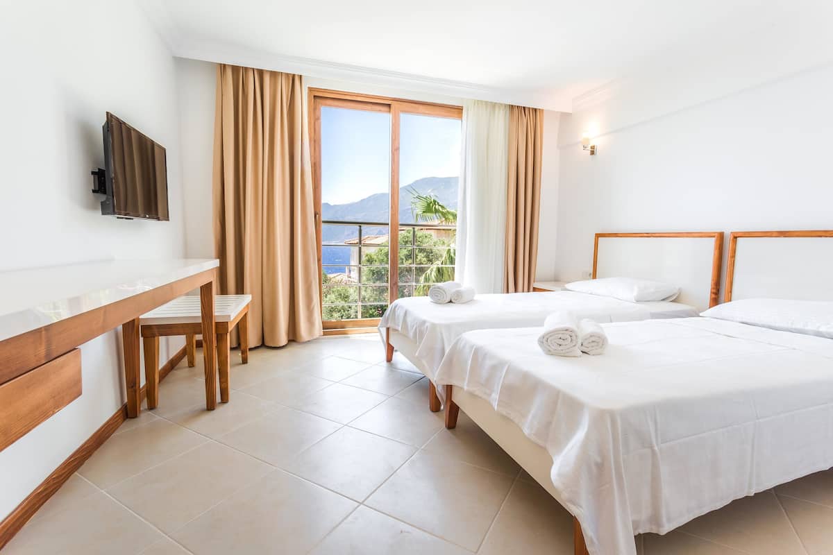 Standard İki Ayrı Yataklı Oda, Kısmi Deniz Manzaralı | 1 yatak odası, ücretsiz kablosuz İnternet, çarşaf takımı