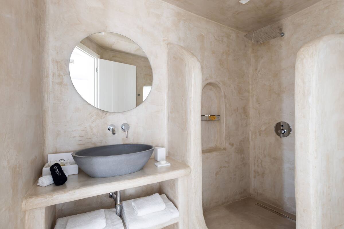 honeymoon villa with sea view and private pool | bathroom | rainfall showerhead, free toiletries, hair dryer, bathrobes