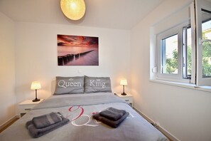 2 chambres, fer et planche à repasser, Wi-Fi, draps fournis