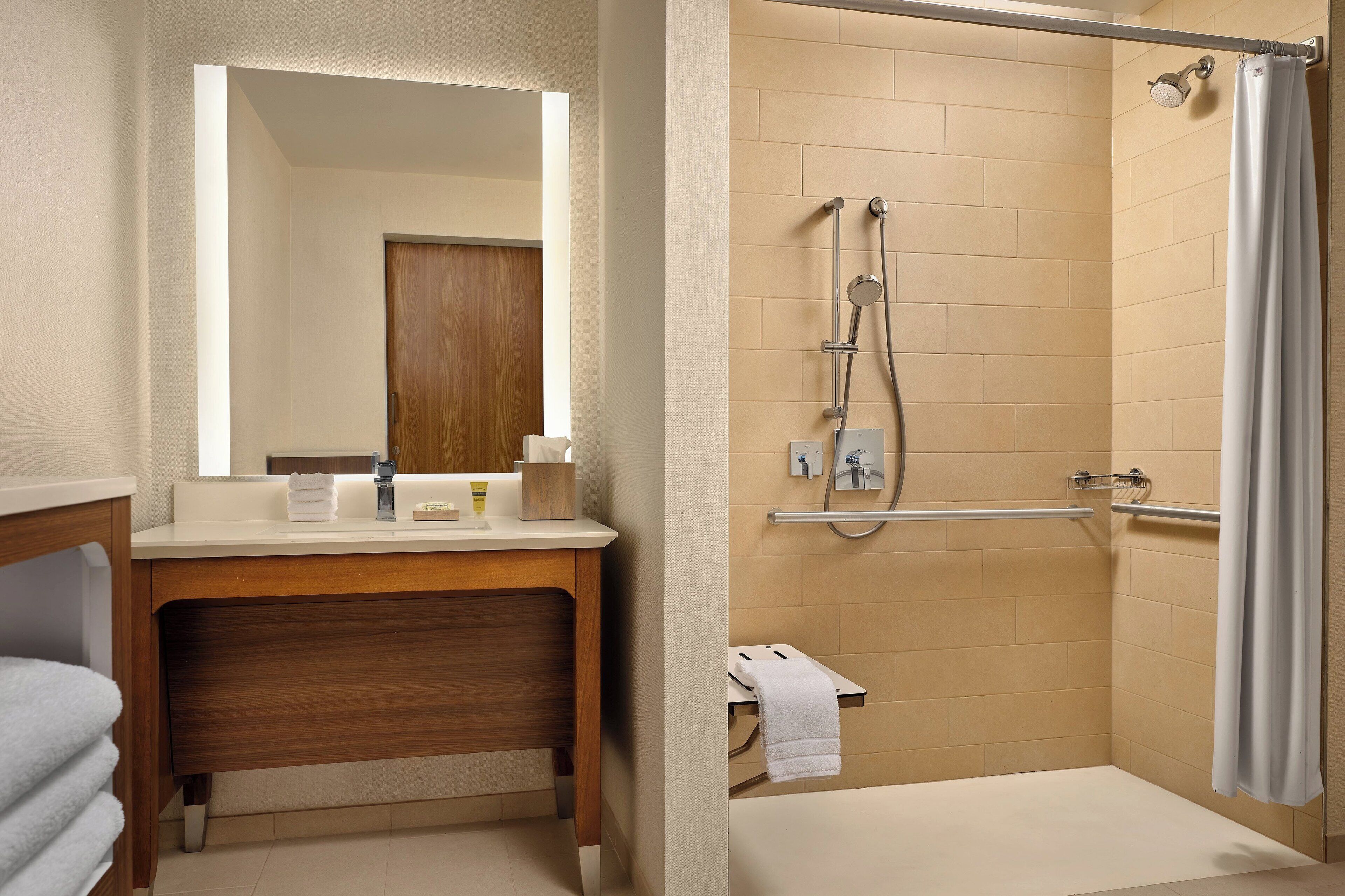 shower, free toiletries, hair dryer, towels