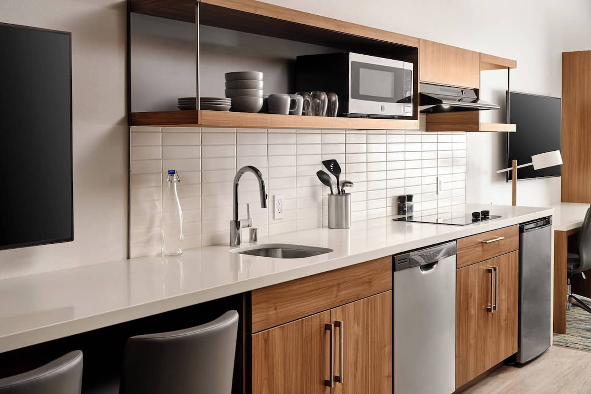 microwave, stovetop, dishwasher, coffee/tea maker