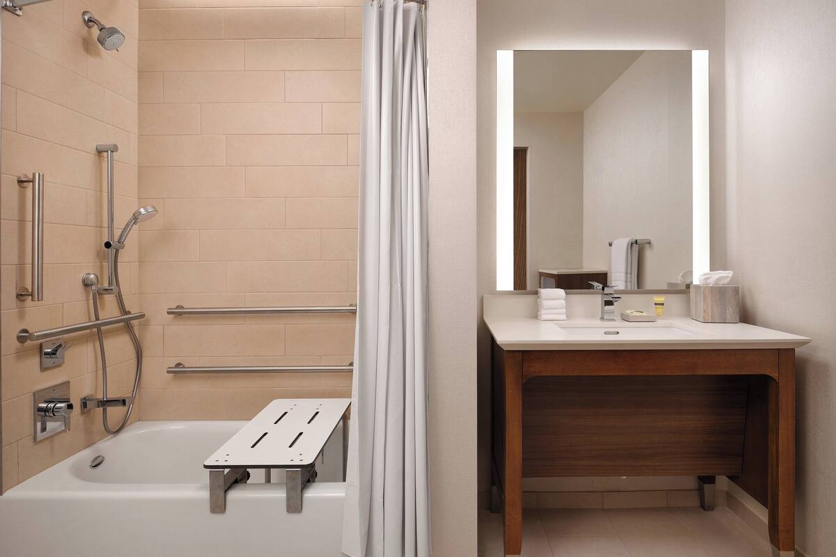 shower, free toiletries, hair dryer, towels