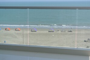 On the beach, beach towels