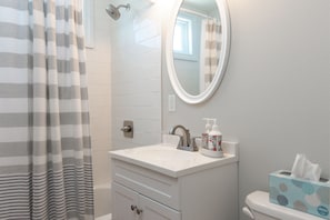 Combined shower/tub