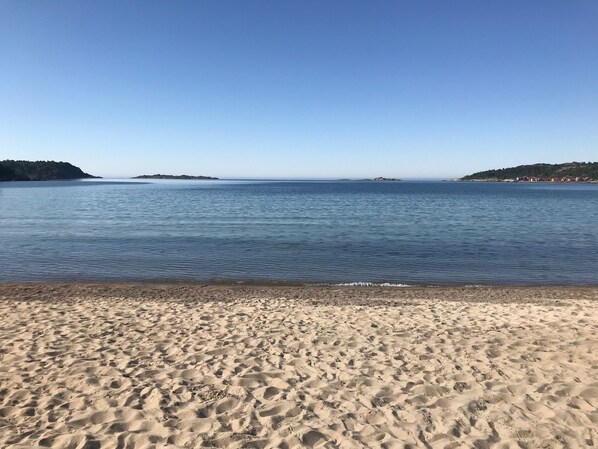 On the beach, sun-loungers, beach towels