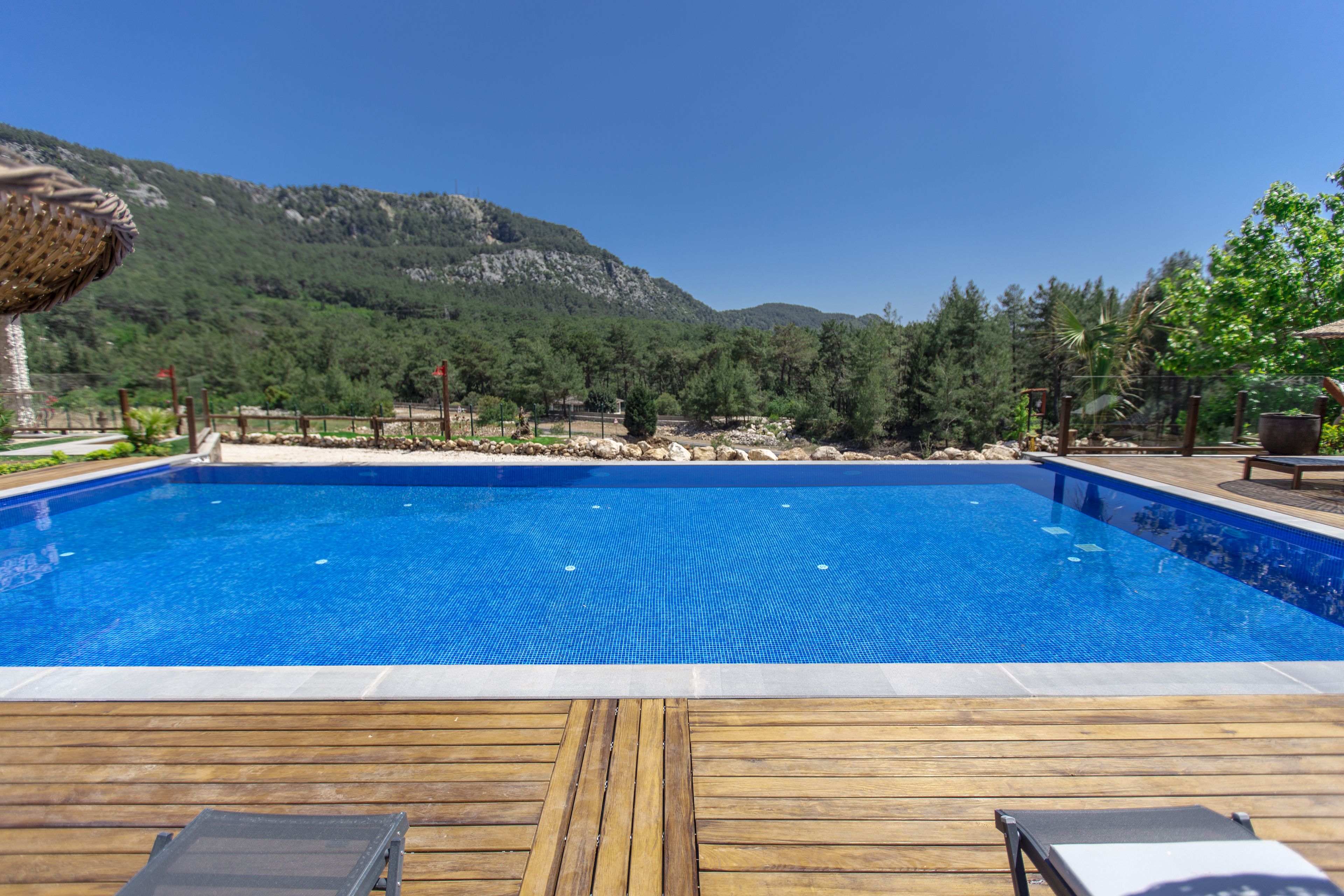 outdoor pool, pool umbrellas, pool loungers