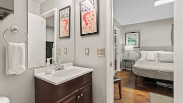 Combined shower/tub, hair dryer, towels, soap