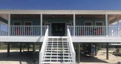 NEW RENTAL!!! Conch Heaven is a four bedroom house on a canal with a dock.