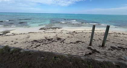 NEW RENTAL!!! Conch Heaven is a four bedroom house on a canal with a dock.
