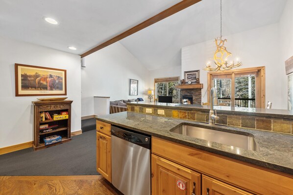 Interior - Rustic & modern 2 bdrm cabin-style condo with stunning natural woodwork, well appointed kitchen, private balcony and direct access to pool. (Vail)