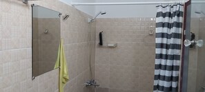 Shower, towels, soap, toilet paper