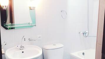 Shower, free toiletries, hair dryer, slippers