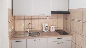 Coffee/tea maker, fridge, cookware/dishes/utensils, dining table - Apartment Mihalić (10070-A1) (Silo - island Krk)