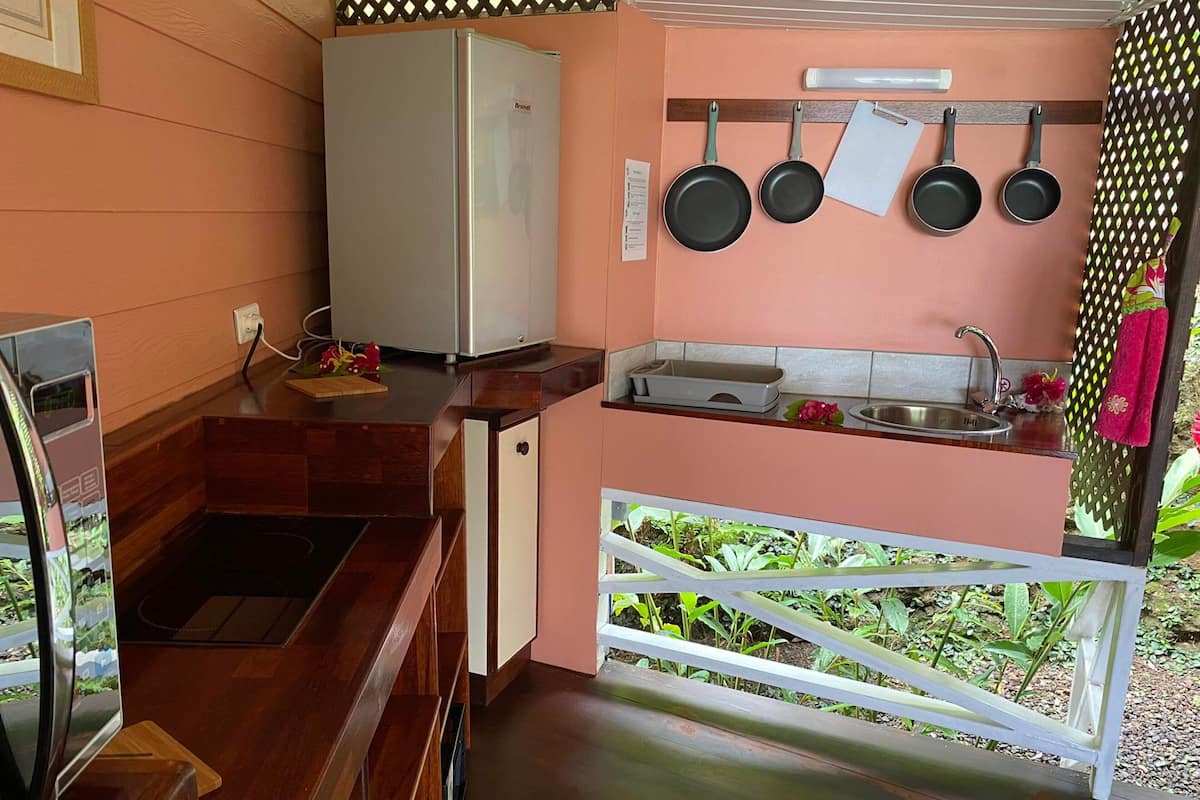 bungalow, private bathroom, lagoon view | private kitchen | mini-fridge, coffee/tea maker, electric kettle, high chair