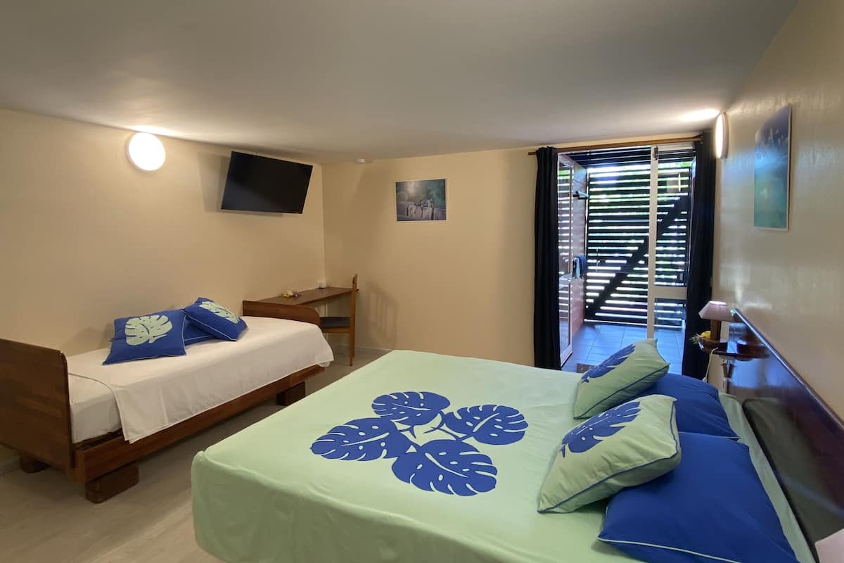 family studio, private bathroom, garden view | 1 bedroom, select comfort beds, minibar, individually decorated