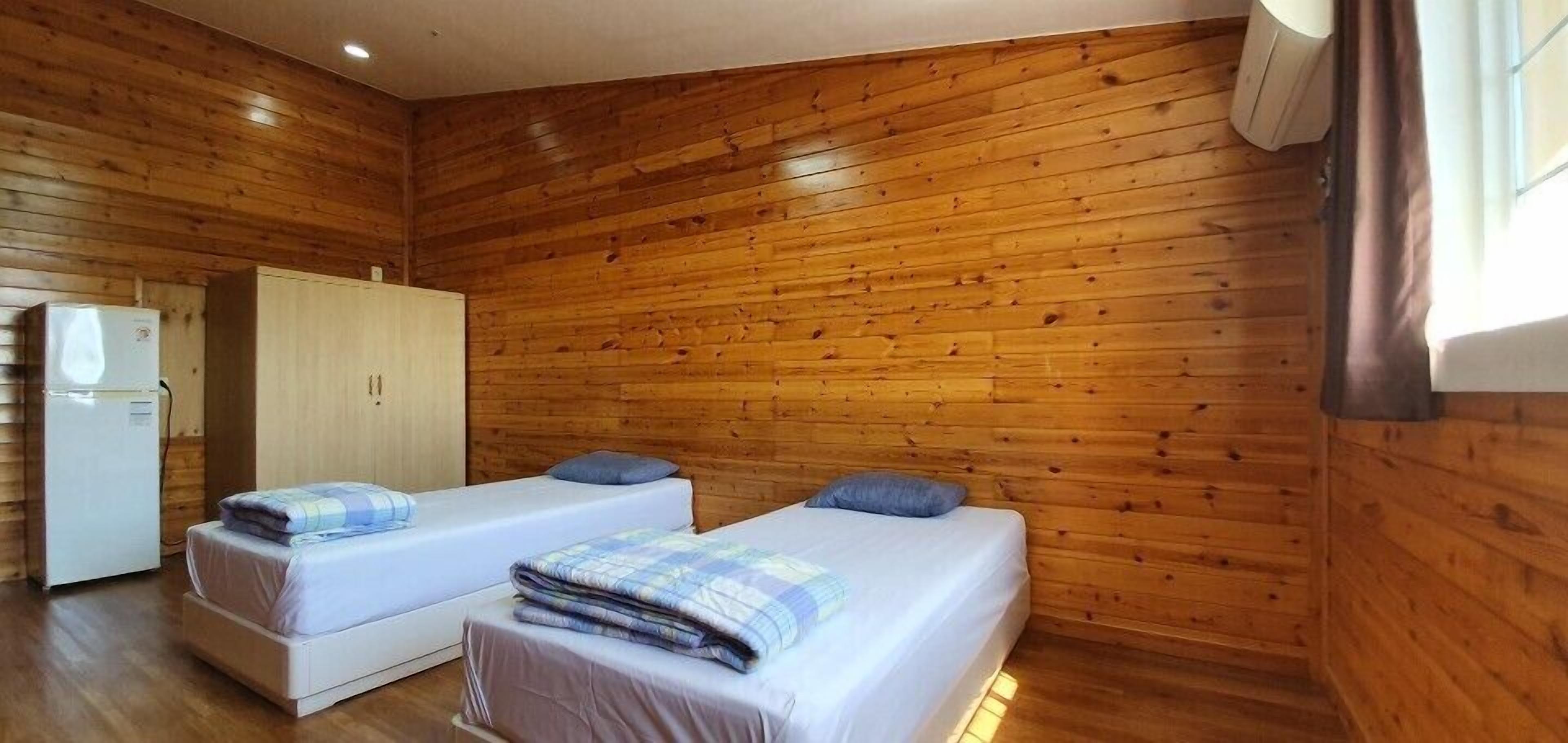 twin room, partial ocean view | blackout curtains, free wifi