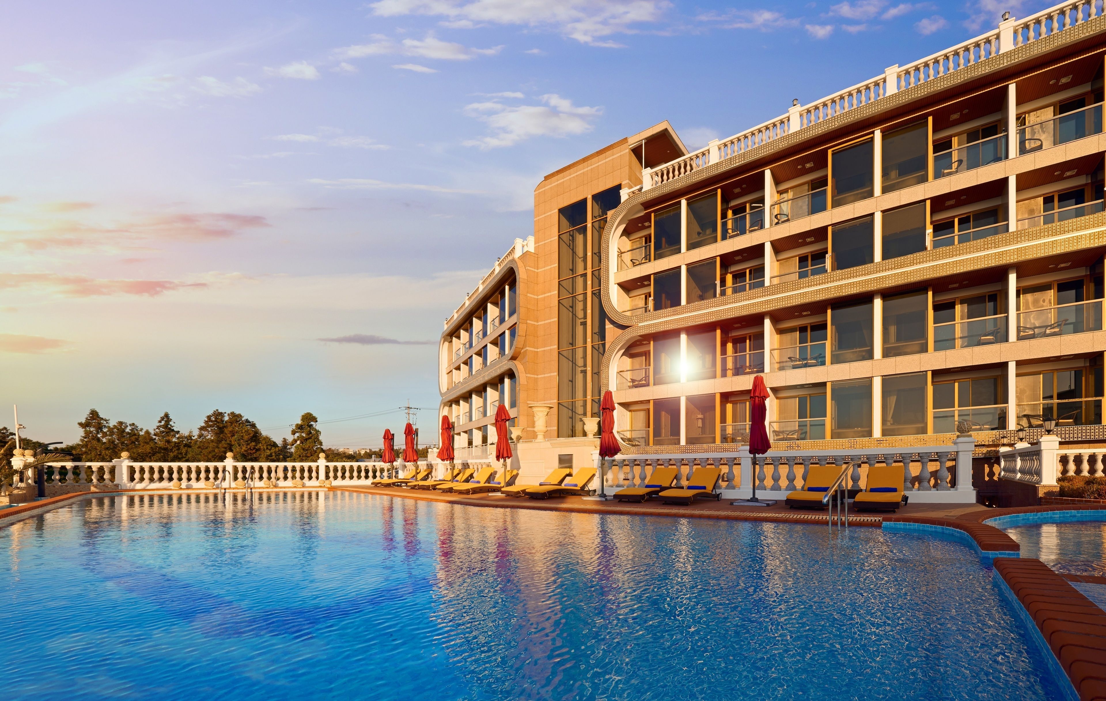 Outdoor pool, open 10:00 AM to 10:00 PM, free cabanas, pool umbrellas