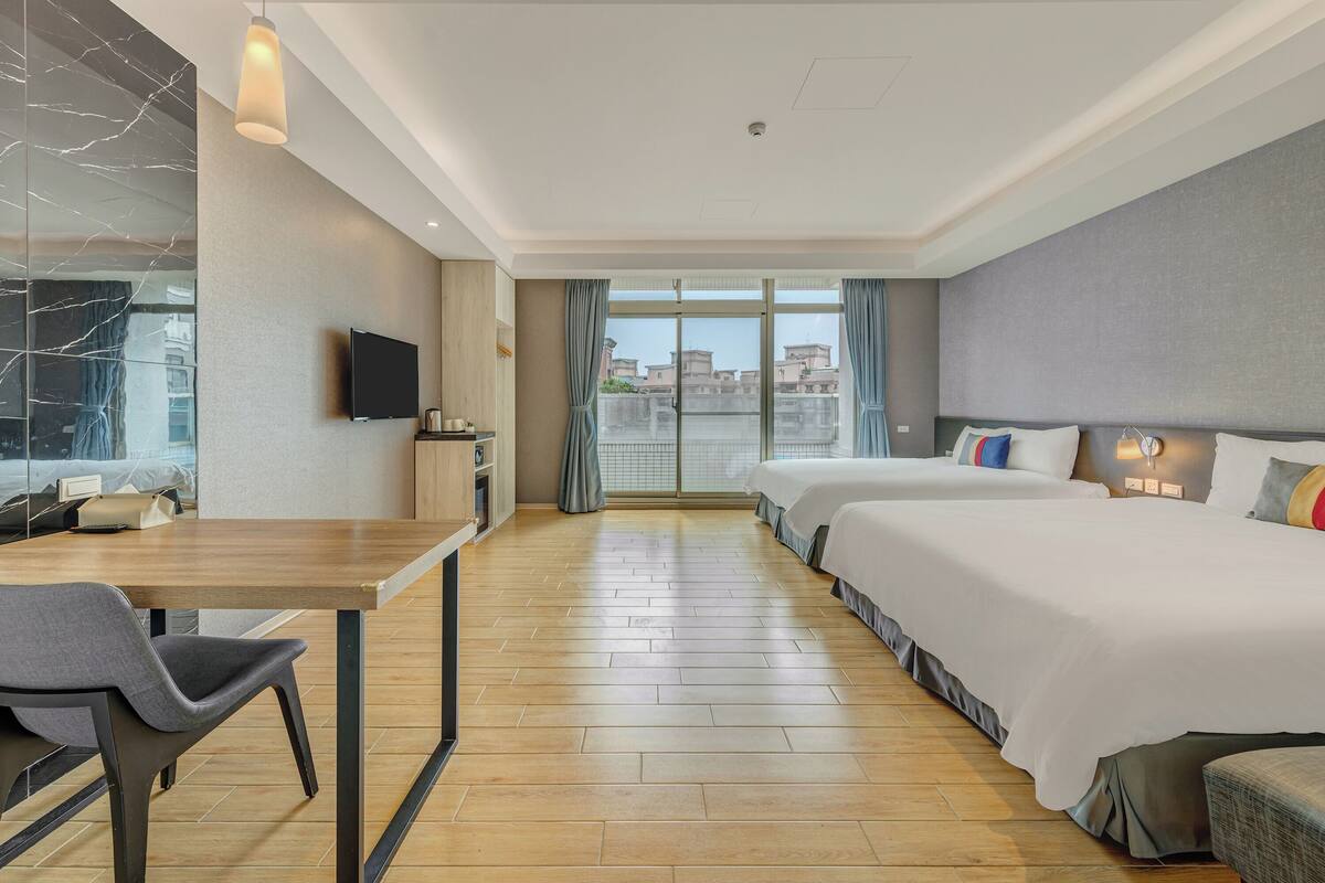 Deluxe Quadruple Room, 2 Queen Beds | 1 bedroom, in-room safe, desk, free WiFi