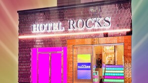 A hotel entrance with a prominent sign reading 'HOTEL ROCKS.' - Hotel Rocks (Tokyo)