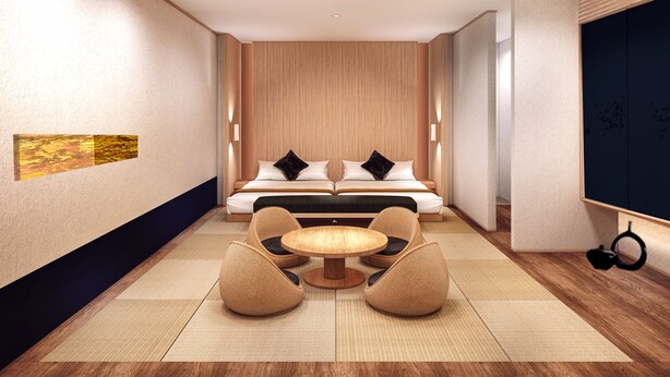 A modern hotel room with a large bed, a round table with chairs, and a wall-mounted TV. - First Cabin Kyoto Nijojo (Kyoto)