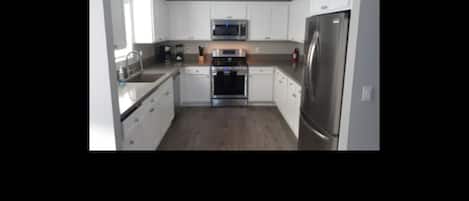 Luxury Shared Dormitory | Private kitchen | Full-sized fridge, microwave, oven, stovetop