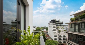 Suite Balcony With City View | Premium bedding, memory-foam beds, minibar, in-room safe - Aurora Premium - A Lifestyle Hotel (Hanoi)